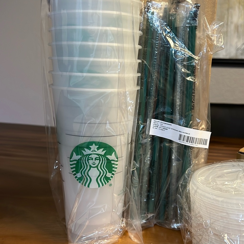 Starbucks Reusable Cups with lids and straws.